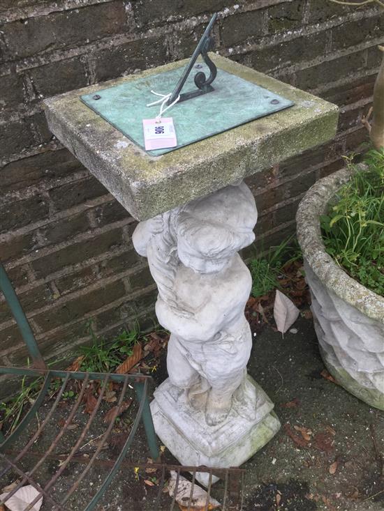 Sundial on stonework, child statue(-)